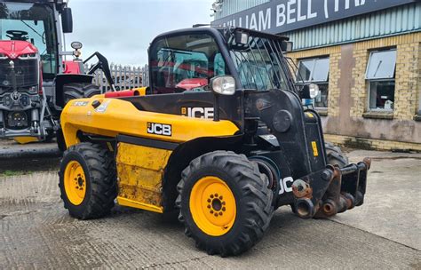 jcb 515 40 vs skid steer|jcb backhoe review.